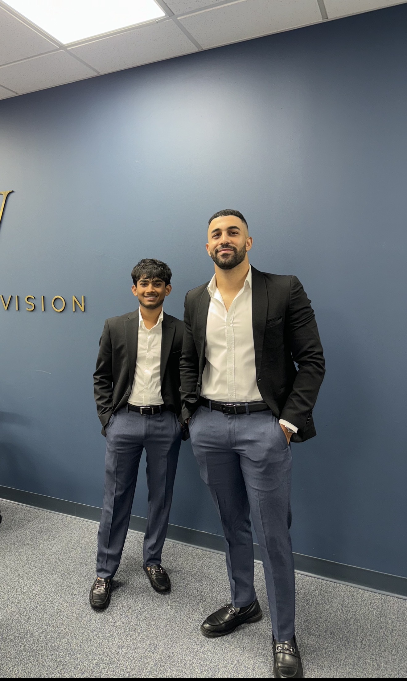 Fine Line Vision team members at the office